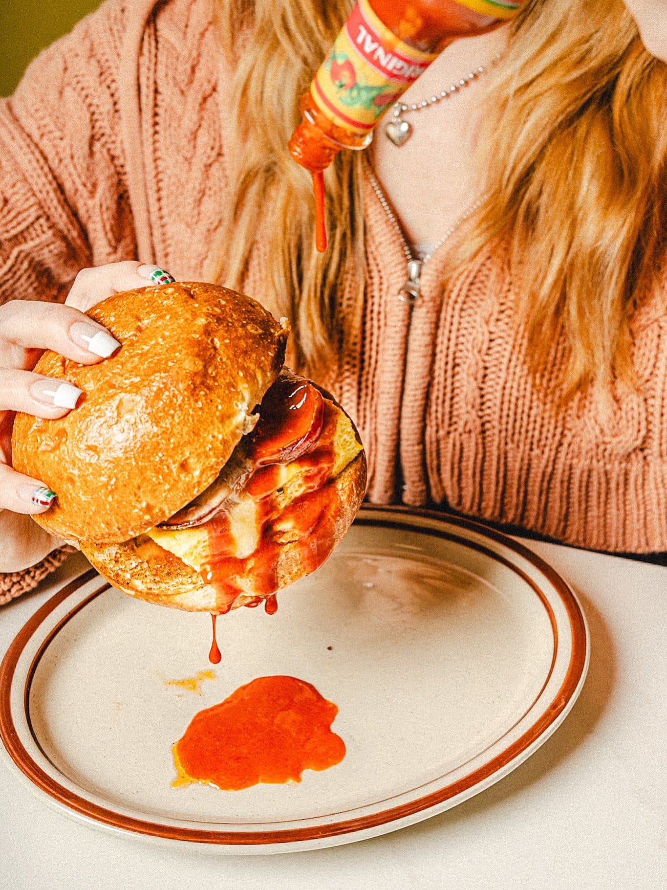 breakfast sandwich drippy hot sauce